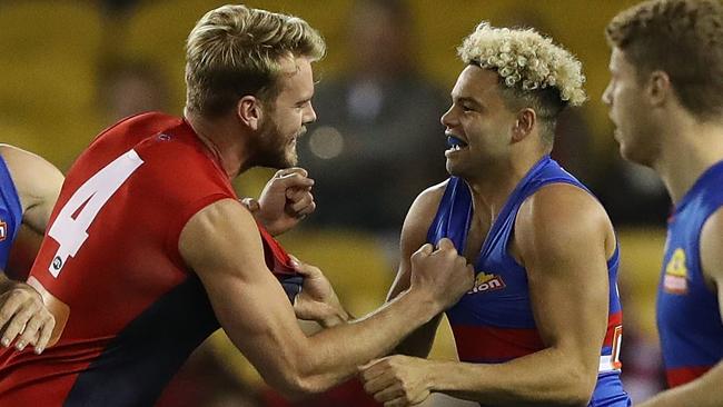 Jack Watts and Jason Johannisen tussle in Round 13’s clash between Melbourne and the Western Bulldogs. (Photo by Robert Cianflone/Getty Images)