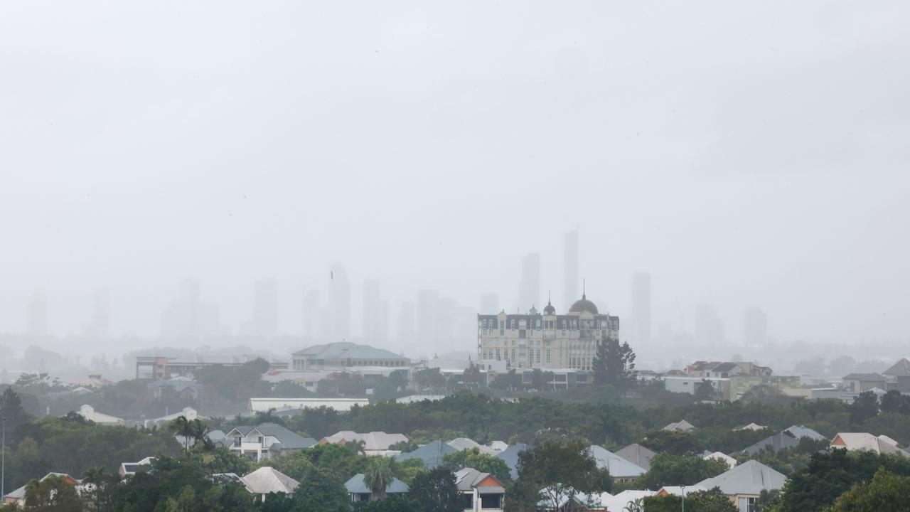 Wet weather hangs over the Gold Coast this morning with the Coast’s skyline virtually hidden behind rain. Picture Glenn Hampson