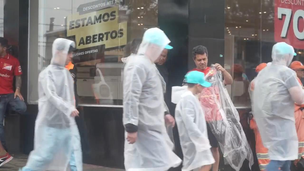 Fans flock to the Brazil Grand Prix on a rainy weekend