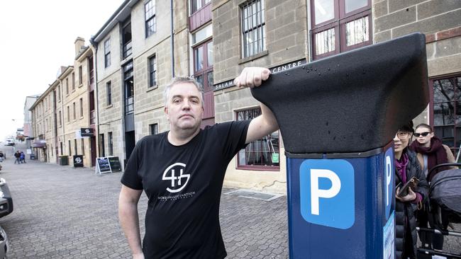 Edwin Johnstone, co-owner of Some Hallucination hairdressing salon at Salamanca is not happy about the parking price increase near his business. Picture Eddie Safarik