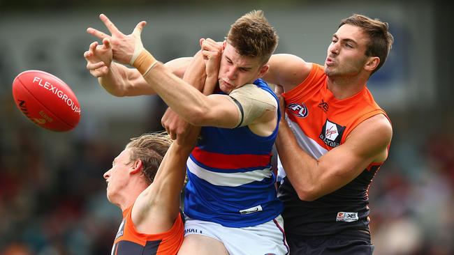 Billy Gowers has a marking attempt spoiled by Jeremy Finlayson. Picture: Getty Images