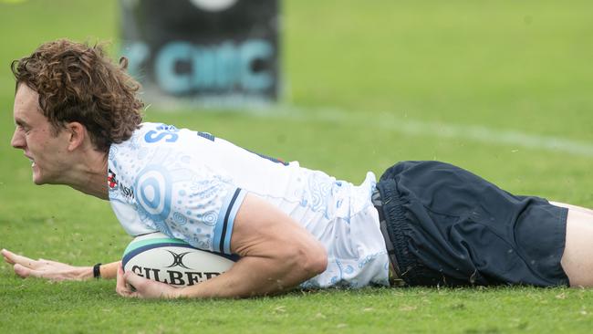 Jay McKenzie scores the first of his two first half tries.