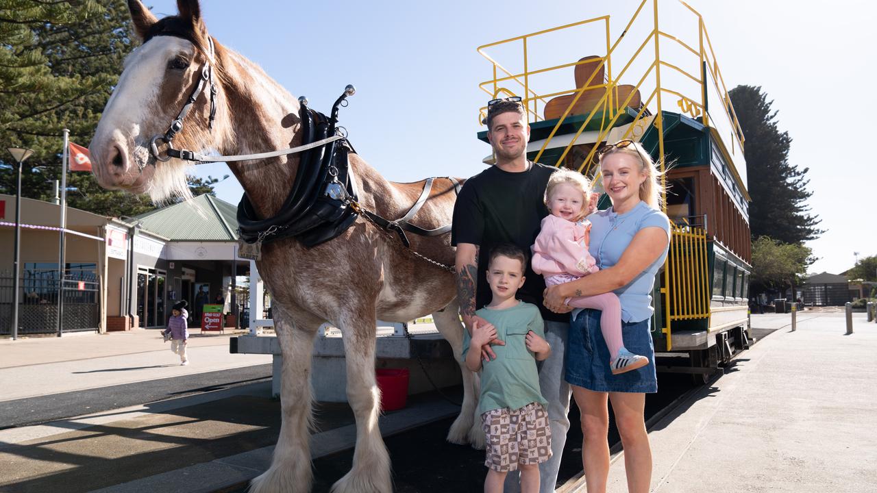 Chris and Steph Wheaton with their children Ollie (5) and Daisy (3) with the horse tram back in action after an unfortunate hiatus due to algae problems. Picture: Tim Joy