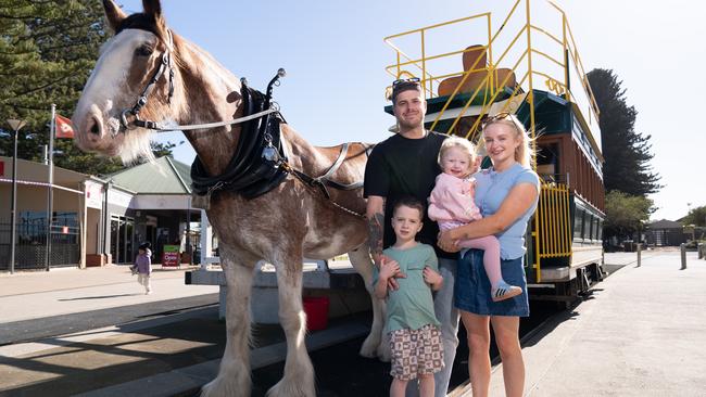 Chris and Steph Wheaton with their children Ollie (5) and Daisy (3) with the horse tram back in action after an unfortunate hiatus due to algae problems. Picture: Tim Joy