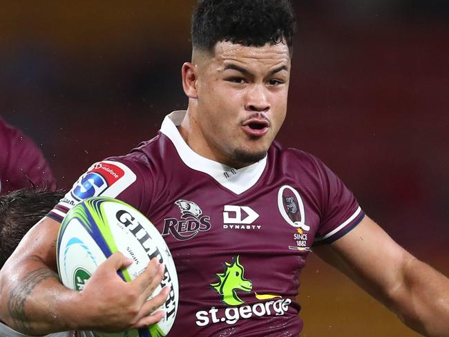 BRISBANE, AUSTRALIA - FEBRUARY 29: Hunter Paisami of the Reds runs the ball during the round five Super Rugby match between the Reds and the Sharks at Suncorp Stadium on February 29, 2020 in Brisbane, Australia. (Photo by Chris Hyde/Getty Images)