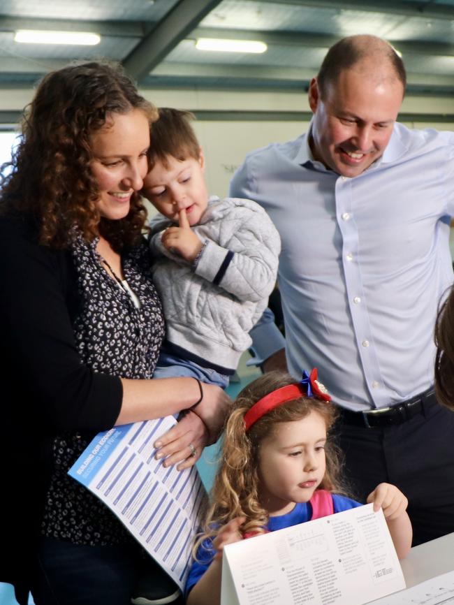 Treasurer Josh Frydenberg goes to cast his vote, with wife Amie, daughter Gemma and son Blake. Picture: Supplied