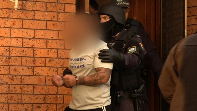 Police swoop on alleged gang members.