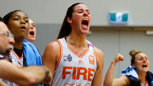 PERTH, AUSTRALIA - NOVEMBER 06: Alex Fowler of the Fire celebrates from the bench during the round two WNBL match between Perth Lynx and Townsville Fire at Bendat Basketball Stadium, on November 06, 2024, in Perth, Australia. (Photo by James Worsfold/Getty Images)