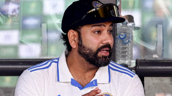 India's captain Rohit Sharma waits for the after-match presentation on on the third day of the second cricket Test match between Australia and India at the Adelaide Oval in Adelaide on December 8, 2024. (Photo by William WEST / AFP) / -- IMAGE RESTRICTED TO EDITORIAL USE - STRICTLY NO COMMERCIAL USE --