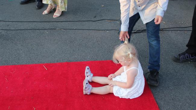 A Gin Gin State High School student of 2035 got some practice in on the red carpet at the 2023 Gin Gin State High School Formal.