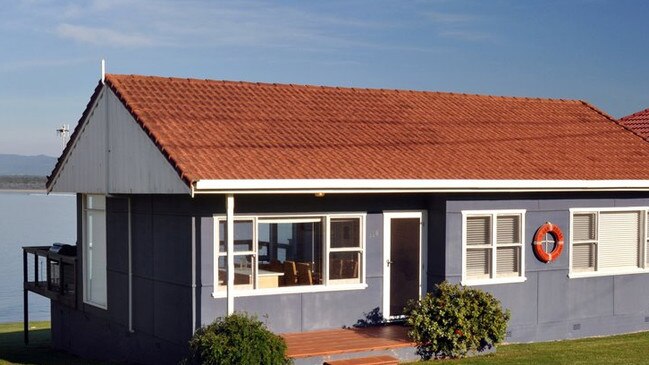 The little blue cottage that Sally fell in love with before it was renovated.