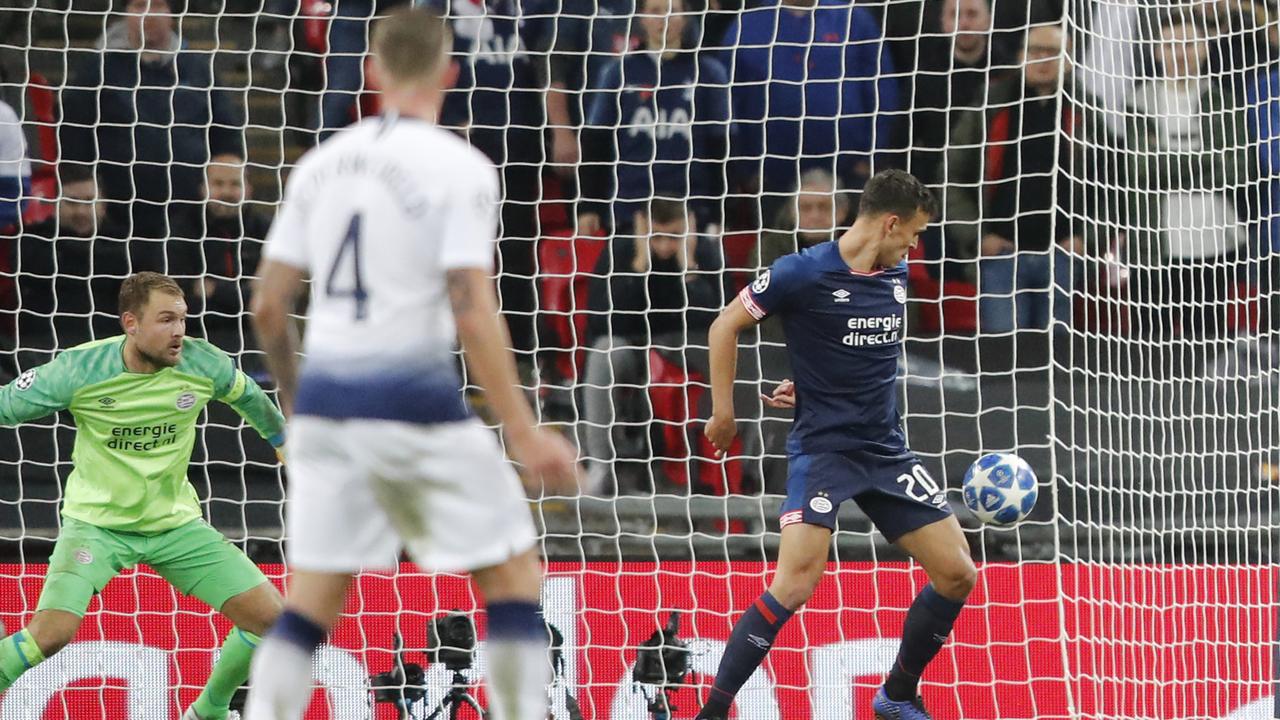 PSV's Trent Sainsbury has the last touch as Spurs score their second goal