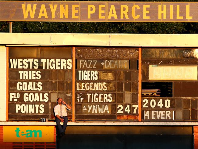 Robbie Farah sits up on the scoreboard drinking beers farewelling his beloved home ground, Leichhardt Oval. Picture: Gregg Porteous