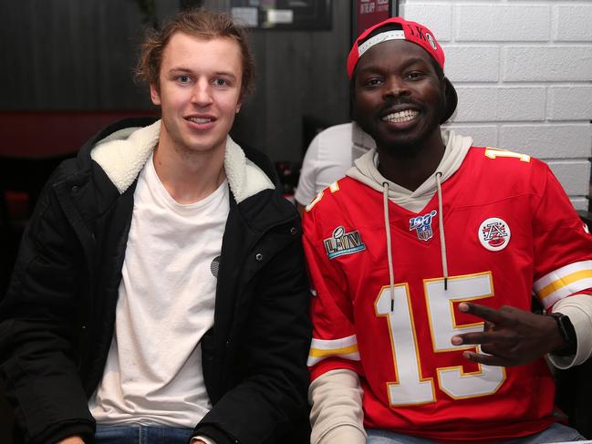 Superbowl fans Ben Pavey and Danny Mazae at the Sporting Globe. Picture: Alison Wynd