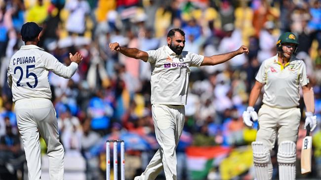 India blew Australia away in the second session on day three. Photo by Indranil MUKHERJEE / AFP