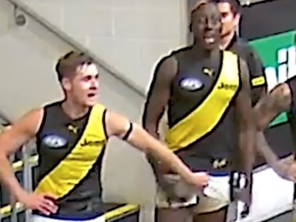 Richmond players are seen groping Mabior Chol during team song in the rooms.