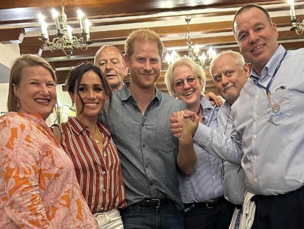 Meghan Markle and Prince Harry flanked by Archewell and restaurant staff for the Duke’s 39th birthday. Picture: Instagram