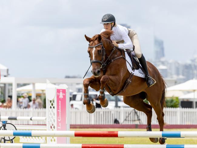 Ally Mowley competing in the Magic Millions Showjumping and Polo. Picture by Luke Marsden