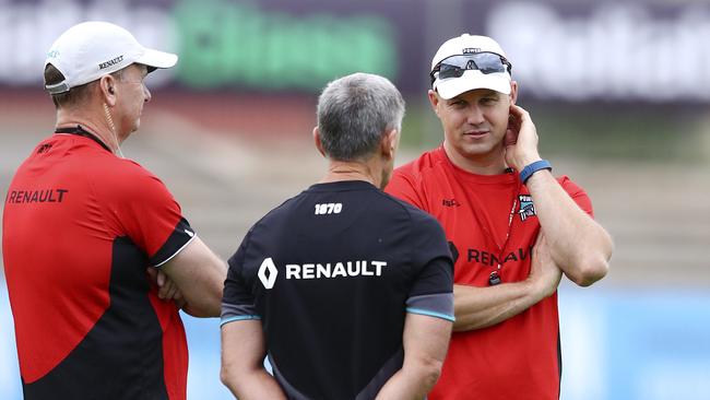 Nicks with Ken Hinkley and doctor Mark Fisher at Port Adelaide where he spent eight years before joining GWS. Picture: Sarah Reed.