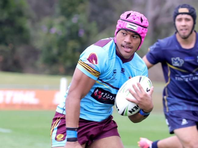 No.3 Joseph Tupuse playing for Keebra Park, about to score a try (pink head gear), Keebra Park (Light) VÃs Mabel Park (Dark), at the Langer Trophy rugby league semi-finals, Nundah, Wednesday 7th August - Photo Steve Pohlner