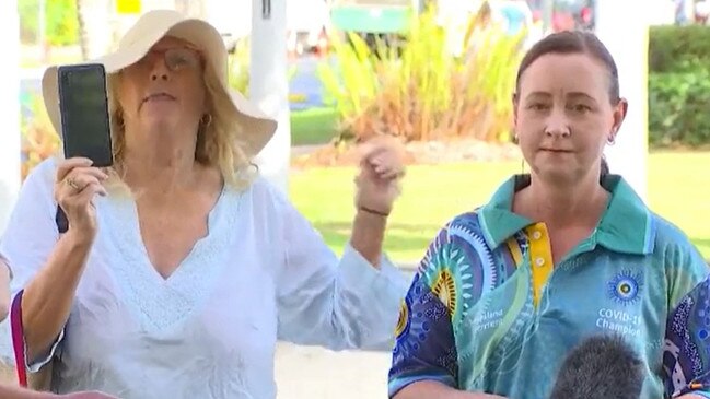 Health Minister Yvette D'Ath is interrupted by an anti-vax protester.