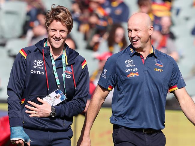 AFL - Sunday, 26th July, 2020 - Adelaide Crows v Essendon at the Adelaide Oval. Crows Captain Rory Sloane - out with a broken hand - walks with Coach Matthew Nicks before the start of the game. Picture: Sarah Reed