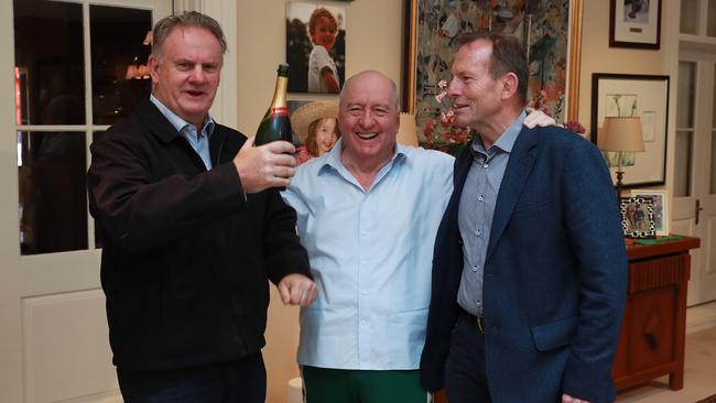 Alan Jones is congratulated by former PM Tony Abbott and Mark Latham after finishing his show on his last day as a radio broadcaster at 2GB. Picture: John Feder