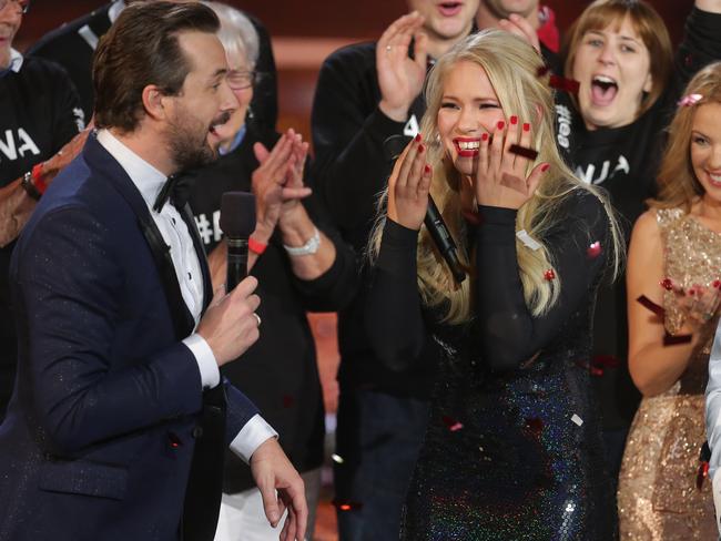 Host Darren McMullen celebrates with a jubilant Anja at Sydney’s Fox Studios.