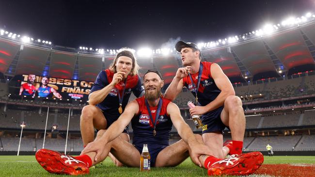 Ed Langdon, Max Gawn and Brayshaw celebrate the 2021 grand final win in Perth. Picture: Michael Willson/AFL Photos via Getty Images.