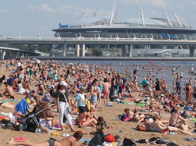 Soaring temperatures in July sent St Petersburg residents to this beach on the Gulf of Finland. Picture: Alexander Demianchuk/TASS