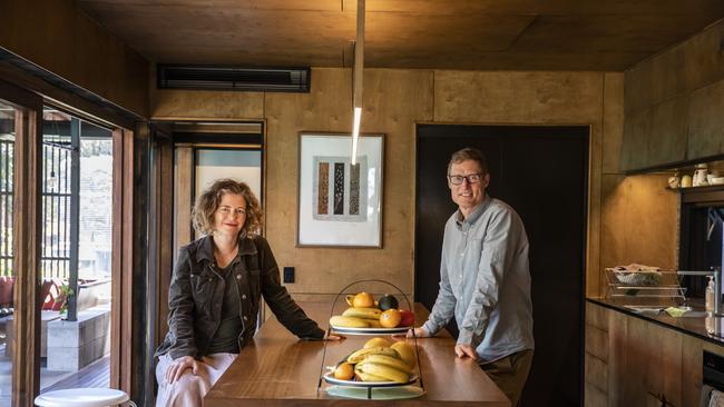 Sonia Graham and Chris Bligh, of Bligh Graham Architects in the kitchen of their “COVID-friendly” Live Work Share home. Picture: Mark Cranitch.