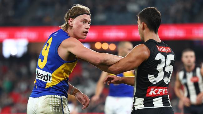 Harley Reid stands Nick Daicos at a throw-in. Picture: Quinn Rooney/Getty Images