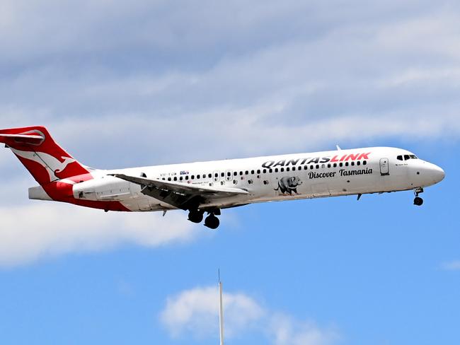 SYDNEY, AUSTRALIA - NewsWire Photos NOVEMBER 3, 2022: A QantasLink plane prepares to land at Sydney Domestic Airport.Picture: NCA NewsWire / Jeremy Piper