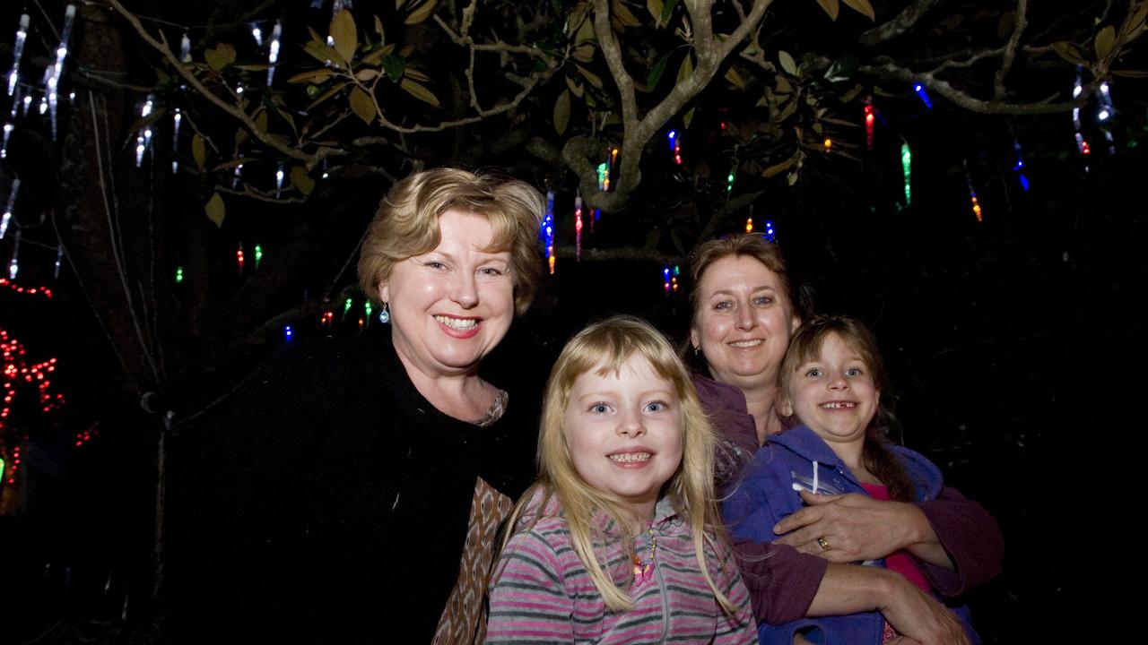 (From left) Jodie and Madison Sander of Toowoomba with their friends from Brisbane Linda and Georgia Bachmann at Toowoomba's Christmas Wonderland in Queens Park, Saturday, December 03, 2011. Photo Kevin Farmer / The Chronicle