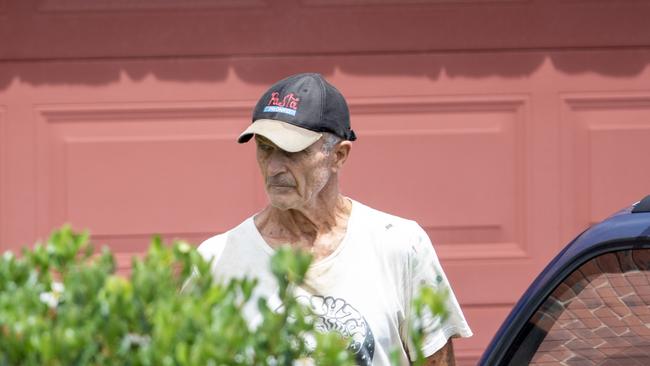 Jon Winfield gardening at the former home of the late Beverley Brooker. Mr Winfield owns the home after being made prime beneficiary in Ms Brooker’s will six months before she died. Picture: Liam Mendes