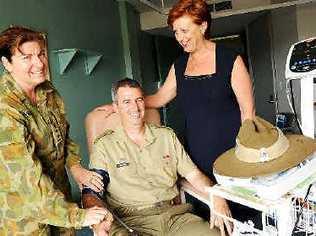 Army Reserve nursing officer Robyn Hanckel (left) at yesterday’s presentation with Capt Warren Walsh, of Lismore’s 41st Battalion, and Deborah Lewis, St Vincent’s Hospital director of clinical services. Picture: Jacklyn Wagner