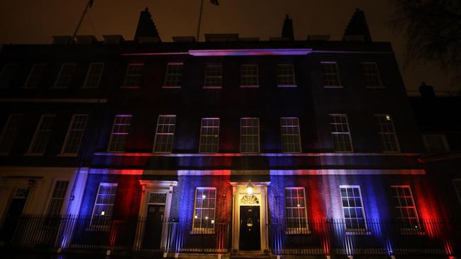 The colours of the British Union flag illuminate the exterior of 10 Downing Street, the residence of the British Prime Minister, in London. Picture: AP