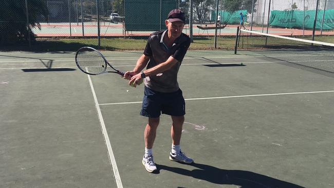 Jim Joyce on the exact spot where Ash Barty hit her first shot at the West Brisbane Tennis Centre.