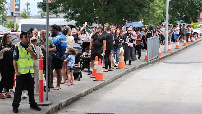 Queues outside the Coles in Fairfield. Picture: Rohan Kelly