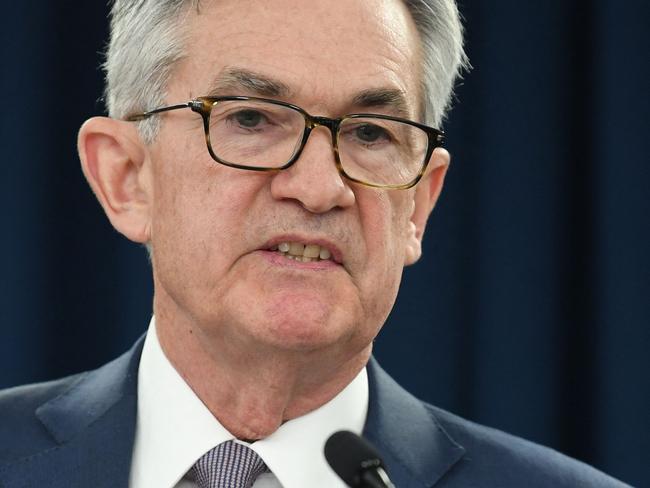 (FILES) In this file photo US Federal Reserve Chairman Jerome Powell gives a press briefing after the surprise announcement the FED will cut interest rates on March 3, 2020 in Washington,DC. - Federal Reserve chairman Jerome Powell said he was more worried about the risk of a large-scale cyberattack than another financial crisis like that of 2008. The risks of a 2008-like crisis with a need for government bailouts of banks were "very, very low," the head of the US central bank said during an interview aired April 11, 2021 on CBS's "60 minutes." (Photo by Eric BARADAT / AFP)