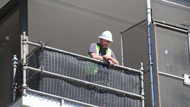 Workmen at the Condev project, Natura, at 112 The Esplanade, Burleigh Heads. Picture: Glenn Hampson