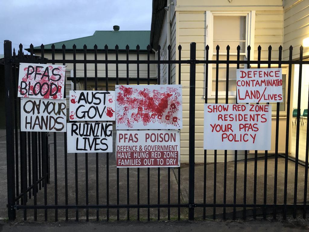 Signs put up by residents on PFAS contamination. Picture: Chris Fogarty, supplied