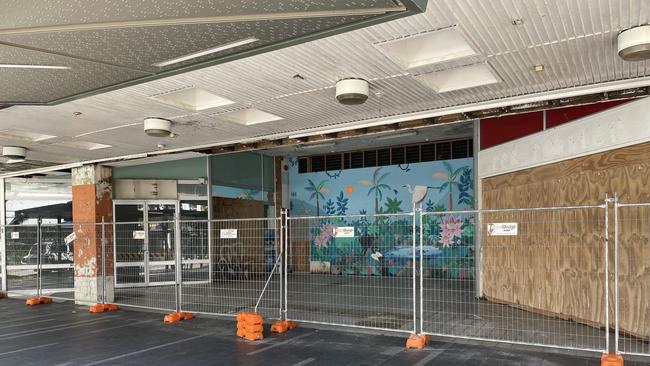 The fenced off entrance to the former Dimmeys Arcade on Flinders St in the Townsville CBD. Picture: Leighton Smith.