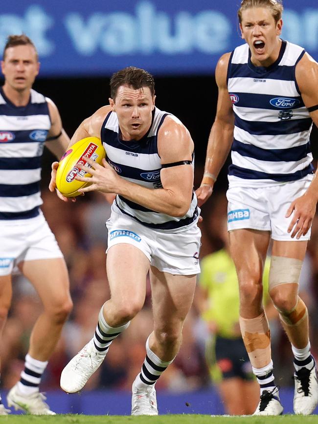 Patrick Dangerfield bursts out of the middle.