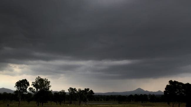 Storms loom over Logan as the clean-up starts with a Mud Army mobilising in Eagleby.