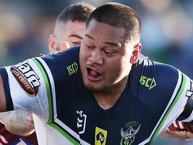 CANBERRA, AUSTRALIA - AUGUST 25: Joseph Leilua of the Raiders offloads the ball in a tackle during the round 23 NRL match between the Canberra Raiders and the Manly Sea Eagles at GIO Stadium on August 25, 2019 in Canberra, Australia. (Photo by Matt King/Getty Images)