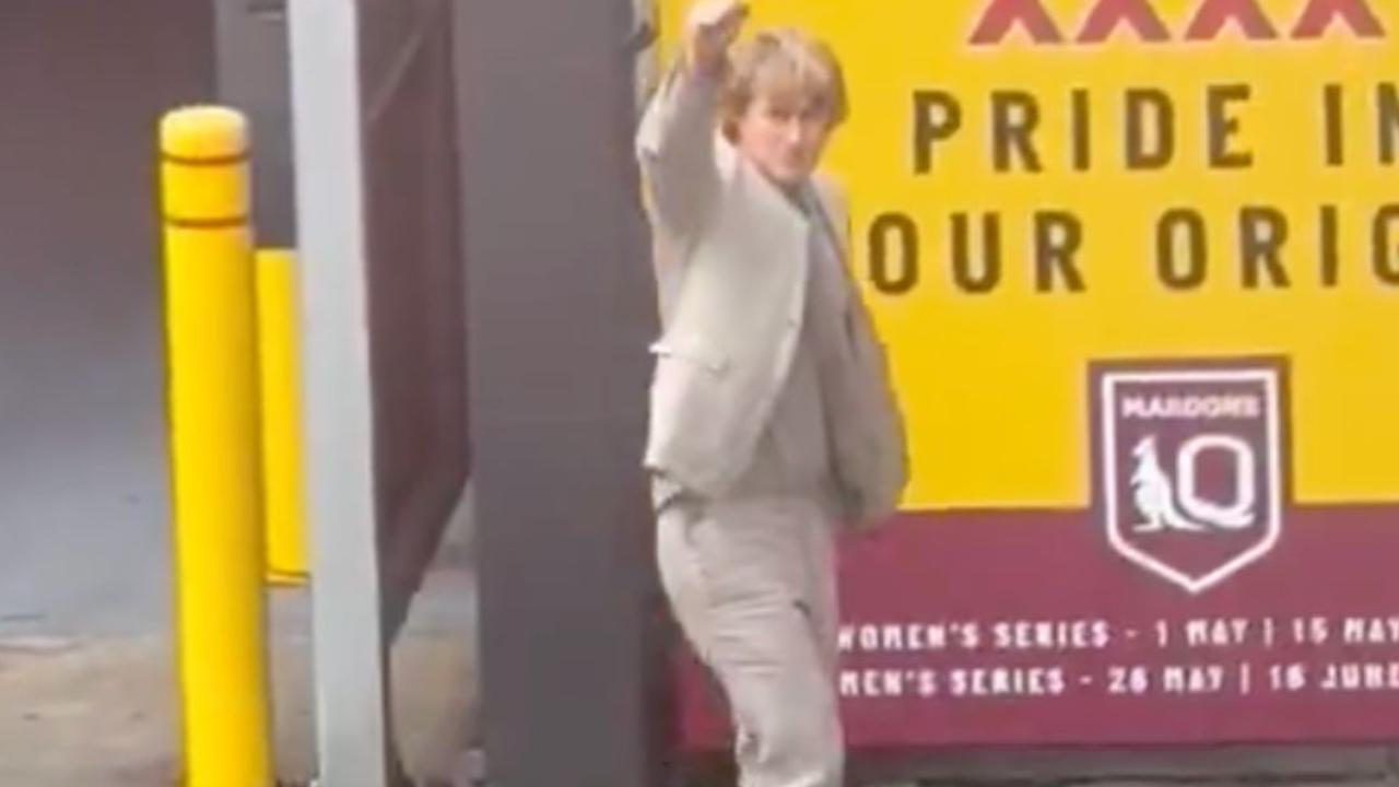 ‘Come up for a beer mate!’: Owen Wilson delights footy fans in Caxton Street