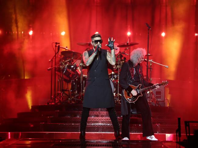 Adam Lambert, Roger Taylor and Brian May on stage in Sydney. Picture: Christian Gilles