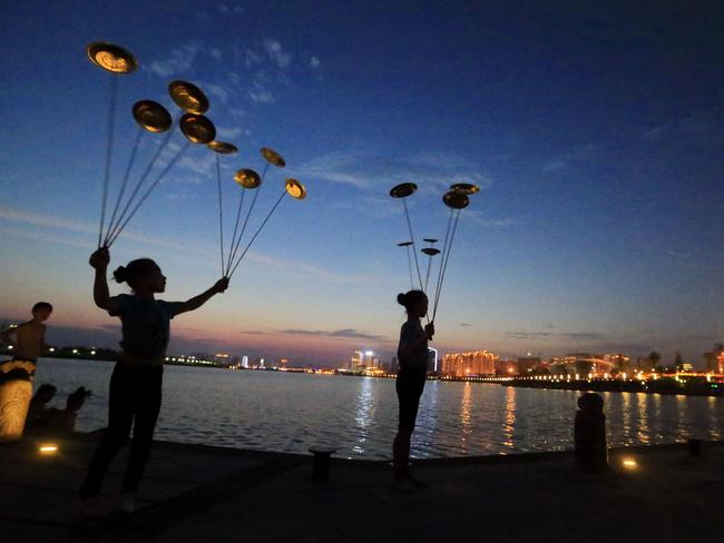 The massive project is widely seen to be part of a Chinese plan to help create markets for goods, but military and political motives are also being questioned. Picture: AFP PHOTO / STR /