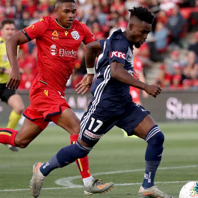 Melbourne Victory’s Elvis Kamsoba and Adelaide United’s Michael Maria at Coopers Stadium on January 17, 2020. (Photo by Jonathan DiMaggio/Getty Images)